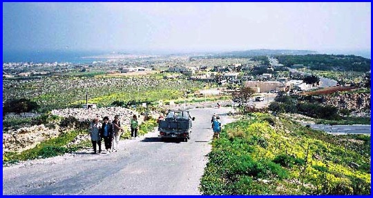 Looking across the Armier Crossroads and along the Marfa Ridge Road